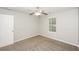 Cozy bedroom with a window and carpeted floors at 6073 Camden Forrest Dr, Riverdale, GA 30296