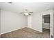 This bedroom has a ceiling fan and neutral decor at 6073 Camden Forrest Dr, Riverdale, GA 30296