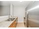 Well-lit kitchen featuring stainless steel appliances, granite countertops, and wood cabinets at 6073 Camden Forrest Dr, Riverdale, GA 30296