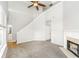 Bright living room with soaring ceilings, fireplace, and neutral decor at 6073 Camden Forrest Dr, Riverdale, GA 30296