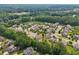 Stunning aerial view of the neighborhood showcasing lush greenery and well-maintained homes at 776 Amos Ln, Kennesaw, GA 30152