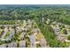 Picturesque aerial shot of a residential area with lush landscaping and well-kept properties at 776 Amos Ln, Kennesaw, GA 30152