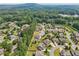 Beautiful aerial view of a well-planned community with mature trees and manicured lawns at 776 Amos Ln, Kennesaw, GA 30152