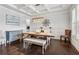 Elegant dining room with coffered ceilings, wainscoting, and a decorative light fixture at 776 Amos Ln, Kennesaw, GA 30152
