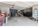 Spacious two-car garage with ample storage and parking for a vehicle at 776 Amos Ln, Kennesaw, GA 30152