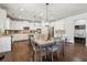 Spacious kitchen with white cabinets, granite countertops, stainless steel appliances, and a central island with seating at 776 Amos Ln, Kennesaw, GA 30152