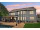 Rear exterior featuring an outdoor living area, spacious backyard, and potential for outdoor enjoyment at 776 Amos Ln, Kennesaw, GA 30152
