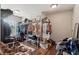 Spacious walk-in closet with custom shelving and hanging racks for organization and storage at 776 Amos Ln, Kennesaw, GA 30152