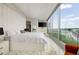 Luxurious main bedroom with floor to ceiling windows and panoramic views of the city at 860 Peachtree Ne St # 2801, Atlanta, GA 30308