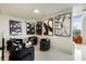 Stylish sitting area with modern art, plush chairs, and an open design at 860 Peachtree Ne St # 2801, Atlanta, GA 30308