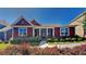 Charming single story home with a well manicured front yard and inviting front porch at 9866 Garden Hill Ln, Douglasville, GA 30135