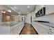 Modern kitchen featuring stainless steel appliances, granite countertops, and ample cabinet space at 9866 Garden Hill Ln, Douglasville, GA 30135