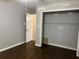 Bedroom with closet and hardwood floors at 172 Camp Sunrise Nw Rd, Cartersville, GA 30121