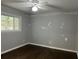 Bedroom with hardwood floors and a window with natural light at 172 Camp Sunrise Nw Rd, Cartersville, GA 30121