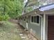 Exterior view of home with siding and a small backyard at 172 Camp Sunrise Nw Rd, Cartersville, GA 30121