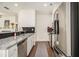 Stylish kitchen featuring granite countertops, stainless appliances, and an open layout at 1884 Plainsboro Dr, Lithonia, GA 30058
