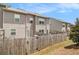 Home's backyard with a wooden fence, offering privacy and outdoor space at 1884 Plainsboro Drive Dr, Lithonia, GA 30058