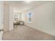 Study room with a neutral color palette and plenty of natural light at 1884 Plainsboro Drive Dr, Lithonia, GA 30058