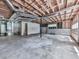 Unfinished basement with exposed ceiling, concrete floor and potential for customization at 301 Jetta Ln, Canton, GA 30115