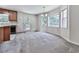 Bright breakfast nook with large windows and a glass door to the outdoor deck at 301 Jetta Ln, Canton, GA 30115
