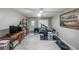 Finished basement featuring exercise equipment, and ample space for activities and entertainment at 58 First Manassas E Way, Sharpsburg, GA 30277