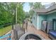 View of the deck with chairs and firepit at 58 First Manassas E Way, Sharpsburg, GA 30277