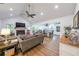Bright open concept living room with vaulted ceilings, fireplace, open to the kitchen at 58 First Manassas E Way, Sharpsburg, GA 30277