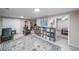 Finished basement area featuring two chairs and decorative rug at 58 First Manassas E Way, Sharpsburg, GA 30277