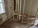 Bathroom with exposed framing and plumbing, offering a blank canvas for creating a custom spa-like retreat at 7235 Thornhill Ne Ln, Atlanta, GA 30328