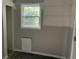 Bedroom ready for renovation with natural light at 7235 Thornhill Ne Ln, Atlanta, GA 30328