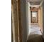 Hallway showcasing exposed studs, offering potential for customization and remodeling for the discerning buyer at 7235 Thornhill Ne Ln, Atlanta, GA 30328