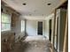 Living area with natural light with visible framework, creating a blank canvas for personalization at 7235 Thornhill Ne Ln, Atlanta, GA 30328