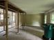 Spacious living area undergoing remodeling, offering potential for customization at 7235 Thornhill Ne Ln, Atlanta, GA 30328