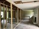 Spacious living room showcasing a fireplace and framing with the possibility to remodel and make your own at 7235 Thornhill Ne Ln, Atlanta, GA 30328