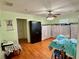 Spacious bedroom with hardwood floors and natural light featuring ample closet space and furnishings at 7326 Leland Ln, Jonesboro, GA 30236