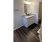 Stylish bathroom featuring a granite countertop, white cabinets, and modern fixtures at 1263 Brookstone Rd, Atlanta, GA 30349