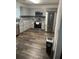 Modern kitchen boasts gray cabinets, stainless steel appliances, and wood-look flooring at 1263 Brookstone Rd, Atlanta, GA 30349
