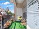 Balcony view with artificial turf, table and chairs, and potted plants at 1850 Cotillion Dr # 2304, Dunwoody, GA 30338