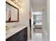 Bathroom vanity with marble countertops, and tile floors at 1850 Cotillion Dr # 2304, Dunwoody, GA 30338
