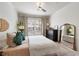 Bedroom with plush rug, neutral paint, and soft, natural light at 1850 Cotillion Dr # 2304, Dunwoody, GA 30338