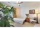 Cozy bedroom with neutral paint, soft carpet, and natural light at 1850 Cotillion Dr # 2304, Dunwoody, GA 30338