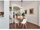 Charming dining area with modern light fixtures and elegant decor, leads to kitchen at 1850 Cotillion Dr # 2304, Dunwoody, GA 30338
