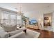 Bright living room with hardwood floors and a chandelier at 1850 Cotillion Dr # 2304, Dunwoody, GA 30338