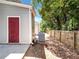 Townhome backyard featuring a storage unit and side yard at 2031 Austin Park Cir, Decatur, GA 30032