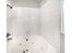 Bright bathroom featuring a large soaking tub with jets and tiled walls at 2031 Austin Park Cir, Decatur, GA 30032