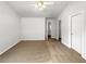 Spacious bedroom with neutral carpet, white walls, and a ceiling fan at 2031 Austin Park Cir, Decatur, GA 30032