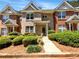 Charming brick townhome with manicured landscaping and inviting entryway at 2031 Austin Park Cir, Decatur, GA 30032