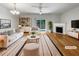 Bright living room with fireplace, hardwood floors, and access to the outdoors at 2031 Austin Park Cir, Decatur, GA 30032