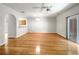 Open-concept living area with hardwood floors, arched doorway, and natural light at 2031 Austin Park Cir, Decatur, GA 30032