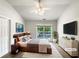 Serene bedroom featuring a ceiling fan, natural light, and closet space at 2031 Austin Park Cir, Decatur, GA 30032